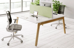 Switch Design 2 Person Bench Desk in White Top with Grey Mesh Back Armchair and Light Green Desk Screen in Modern Office Setting
