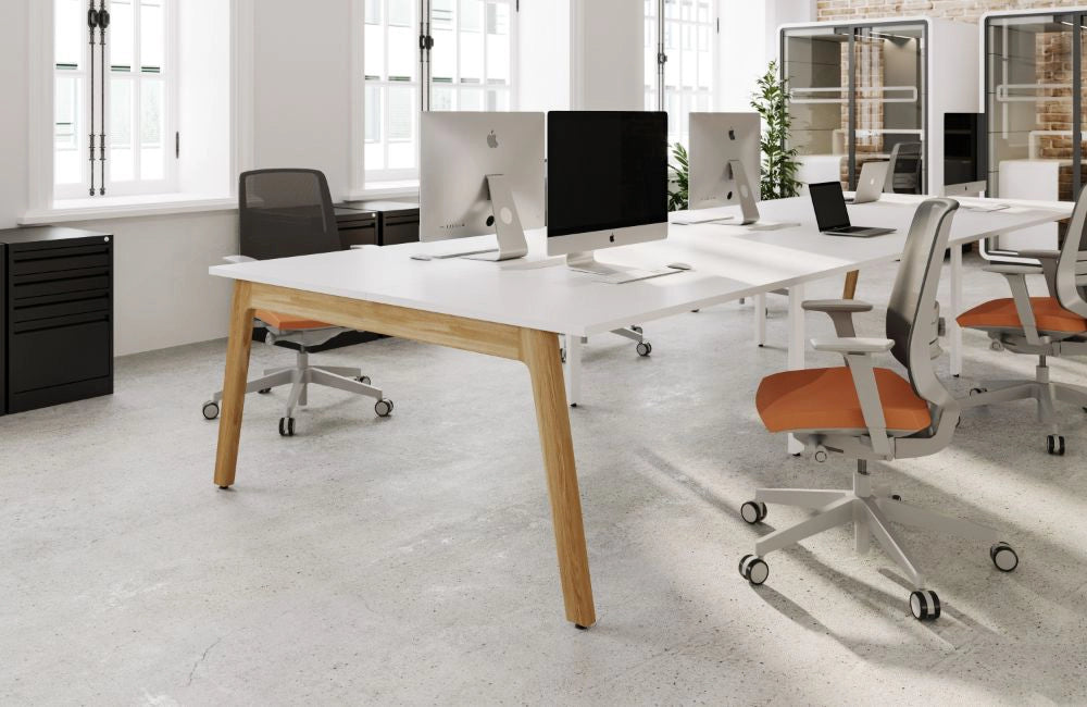 Switch Design 2 Person Bench Desk with Mesh Back Armchair and Closed Metting Pod in Modern Office Setting