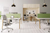 Switch Design 2 Person Bench Desk with Mesh Back Armchair and Green Desk Screen in Modern Office Setting