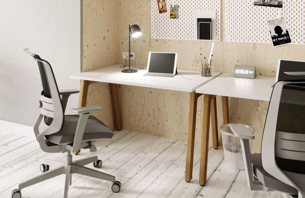 Switch Design Single Bench Desk with Grey Mesh Back Armchair and Small Grey Bin in Modern Office Setting