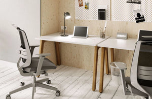Switch Design Single Bench Desk with Grey Mesh Back Armchair and Small Grey Bin in Modern Office Setting