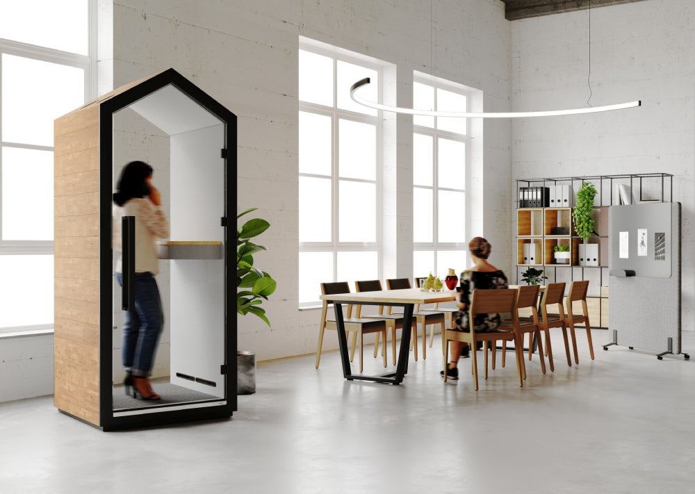 Treehouse Single Person Phonebooth with Rectangular Table in Meeting Room Setting