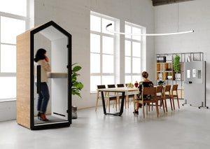 Treehouse Single Person Phonebooth with Rectangular Table in Meeting Room Setting