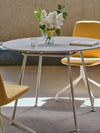 Ulti Office Chair on 4 Star Aluminium Base with Castors with Round Table in Modern Office Setting