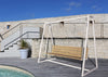 Urbantime H24 Outdoor Swing In 2 Toned Finish With White Plant Pot In Pool Resort Setting
