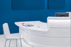 Valde Modular Reception Desk with with Visitor Chair in Reception Setting