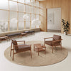 Wudi Upholstered Lounge Armchair With Coffee Table And Floor Rug In Reception Setting