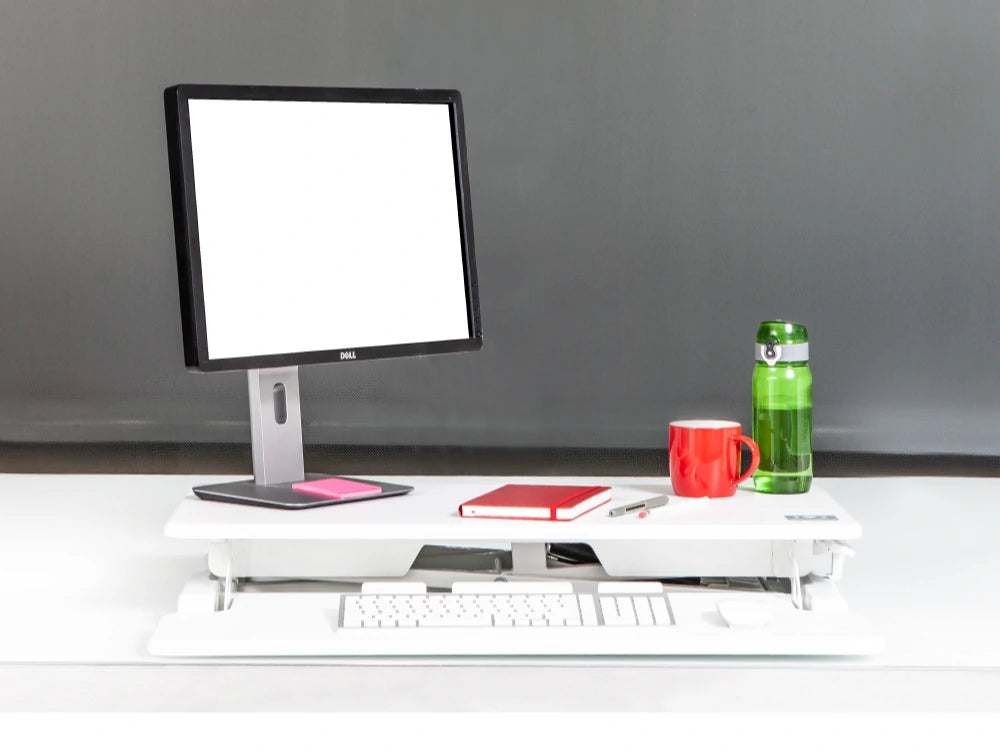 Yo Yo Desk 80 S Sit Stand Solution White 5 With Red Notebook And Computer Set On Top
