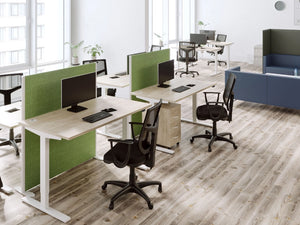 Zoom Single Desk with Bamboo Top in Oak Top Finish with Green Freestanding Desk Screen and Black Armchair in Office Setting 2